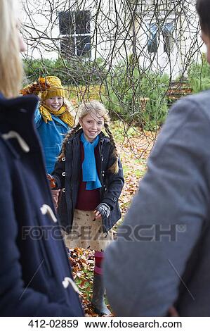 Smiling girls playing outdoors View Large Photo Image Stock Photo - Smiling girls playing outdoors. Fotosearch