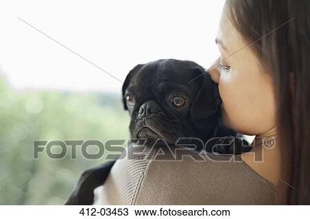 Girl kissing dog on shoulder View Large Photo Image Stock Image - Girl kissing dog on shoulder. Fotosearch