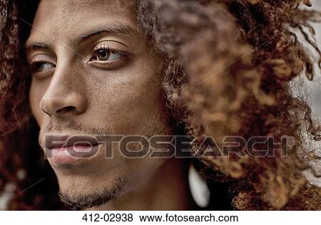 Stock Photo - Close up of serious man's face. Fotosearch