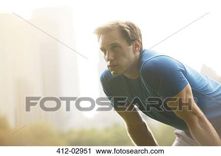 Man resting in urban park View Large Photo Image Stock Image - Man resting in urban park. Fotosearch