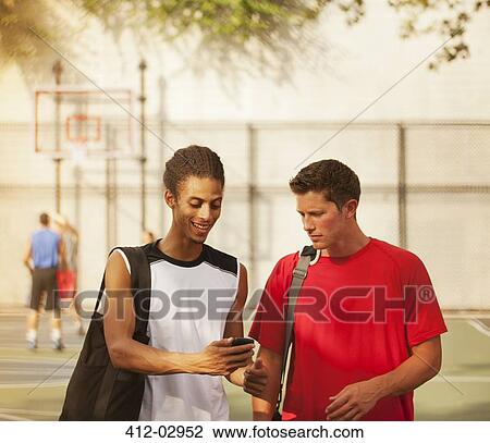Men talking on basketball court View Large Photo Image Stock Image - Men talking on basketball court. Fotosearch