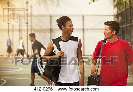 Men talking on basketball court View Large Photo Image Stock Image - Men talking on basketball court. Fotosearch