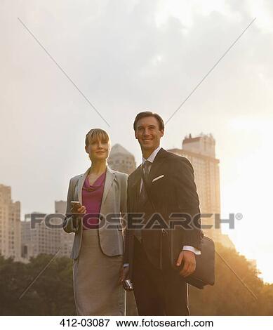 Stock Photo - Business people walking on city street. Fotosearch