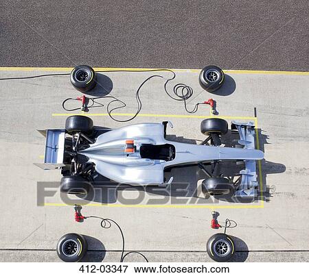 Race car sitting at pit stop View Large Photo Image Stock Photo - Race car sitting at pit stop. Fotosearch