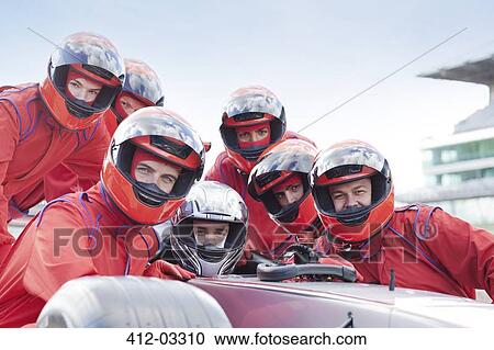 Race car team at pit stop View Large Photo Image Stock Image - Race car team at pit stop. Fotosearch
