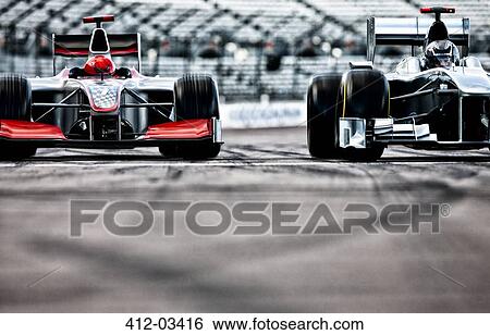 Race cars driving on track View Large Photo Image Stock Photograph - Race cars driving on track. Fotosearch