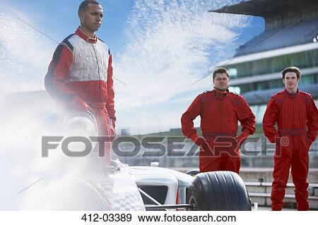 Race team around car on track View Large Photo Image Stock Photo - Race team around car on track. Fotosearch