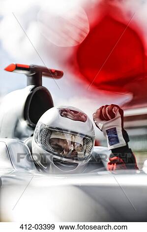 Racer cheering in car on track View Large Photo Image Stock Photo - Racer cheering in car on track. Fotosearch