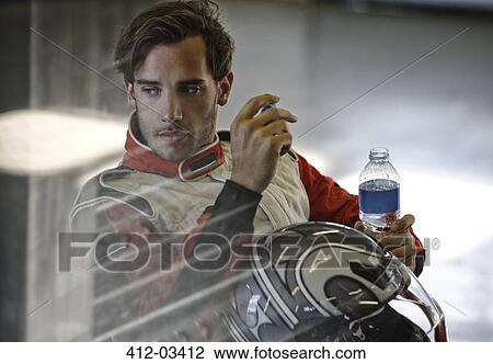 Racer drinking bottle of water View Large Photo Image Stock Image - Racer drinking bottle of water. Fotosearch