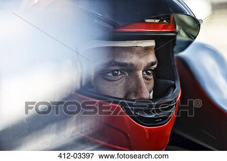 Stock Photo - Racer sitting in car. Fotosearch