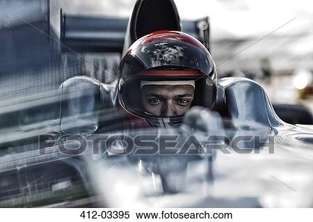Racer sitting in car View Large Photo Image Stock Photography - Racer sitting in car. Fotosearch