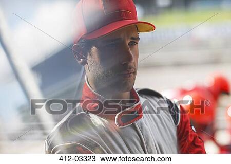 Racer standing on track View Large Photo Image Stock Image - Racer standing on track. Fotosearch