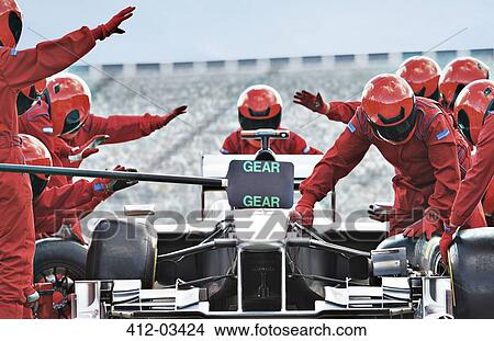 Racing team working at pit stop View Large Photo Image Picture - Racing team working at pit stop. Fotosearch