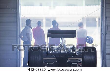 Racing team working at pit stop View Large Photo Image Stock Image - Racing team working at pit stop. Fotosearch