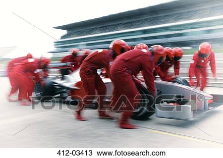 Racing team working at pit stop View Large Photo Image Stock Image - Racing team working at pit stop. Fotosearch
