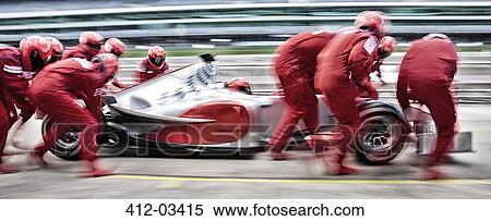 Racing team working at pit stop View Large Photo Image Stock Photography - Racing team working at pit stop. Fotosearch