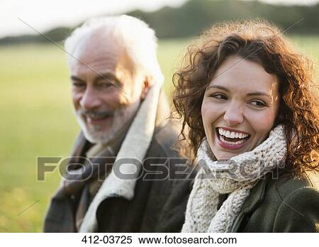 Father and daughter walking in park View Large Photo Image Stock Photography - Father and daughter walking in park. Fotosearch