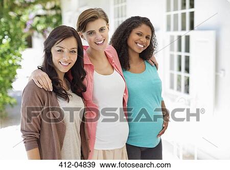 Women smiling together outdoors View Large Photo Image Stock Photo - Women smiling together outdoors. Fotosearch