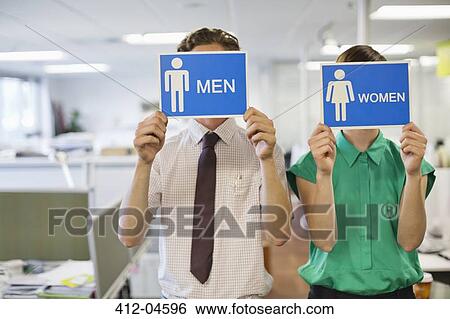 Business people holding? men? and? women? sign View Large Photo Image Stock Photograph - Business people holding? men? and? women? sign. Fotosearch