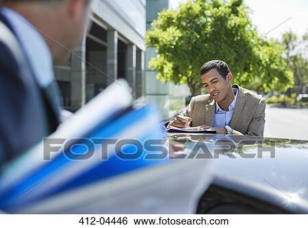 Business people talking at car View Large Photo Image Stock Photograph - Business people talking at car. Fotosearch