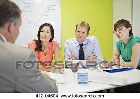 Business people talking in meeting View Large Photo Image Picture - Business people talking in meeting. Fotosearch