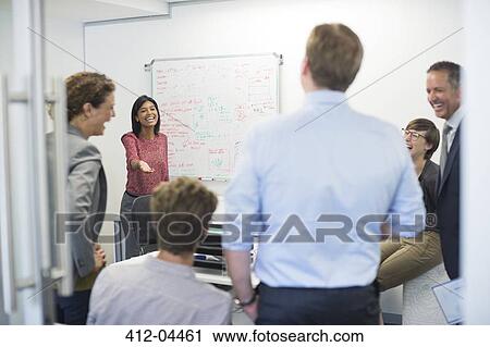 Business people talking in meeting View Large Photo Image Stock Image - Business people talking in meeting. Fotosearch