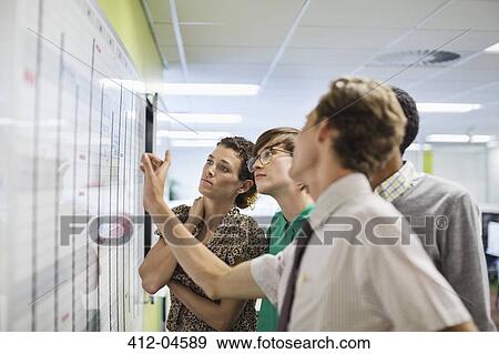 Business people talking in meeting View Large Photo Image Stock Photo - Business people talking in meeting. Fotosearch