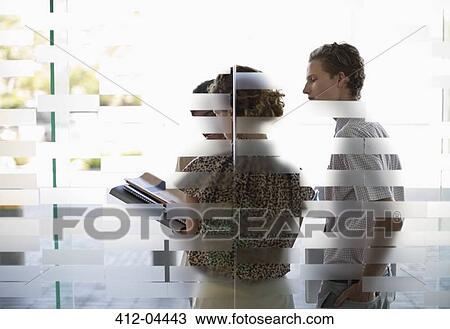 Business people talking in office View Large Photo Image Stock Image - Business people talking in office. Fotosearch