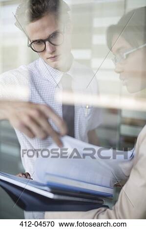 Business people talking in office View Large Photo Image Stock Image - Business people talking in office. Fotosearch