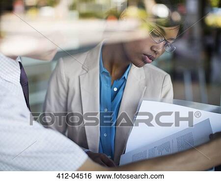 Business people talking in office View Large Photo Image Stock Photograph - Business people talking in office. Fotosearch
