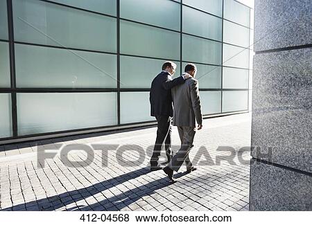 Businessmen talking on city street View Large Photo Image Stock Photo - Businessmen talking on city street. Fotosearch