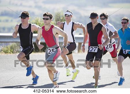Runners in race on rural road View Large Photo Image Picture - Runners in race on rural road. Fotosearch