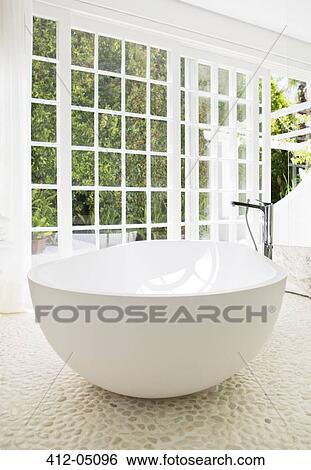 Bathtub in modern bathroom View Large Photo Image Stock Photograph - Bathtub in modern bathroom. Fotosearch
