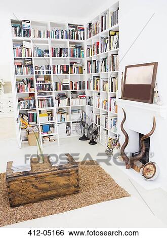 Bookshelves and fireplace in modern living room View Large Photo Image Stock Photograph - Bookshelves and fireplace in modern living room. Fotosearch