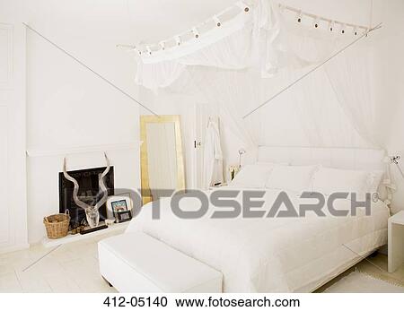 Canopy over bed in modern bedroom View Large Photo Image Stock Image - Canopy over bed in modern bedroom. Fotosearch