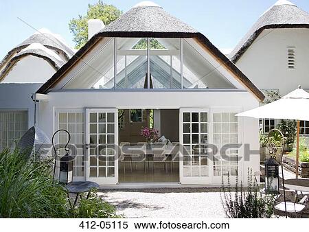 Dining room and backyard of modern house View Large Photo Image Stock Photography - Dining room and backyard of modern house. Fotosearch