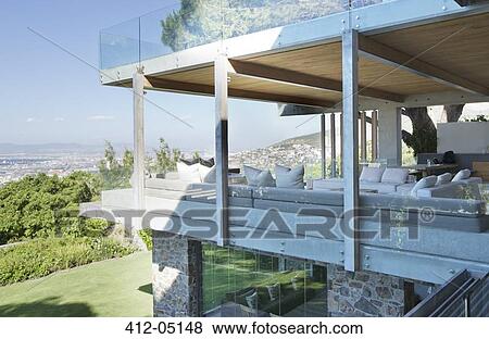 Stock Photo - Glass walls of modern house. Fotosearch