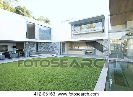 Green lawn in modern backyard View Large Photo Image Stock Image - Green lawn in modern backyard. Fotosearch