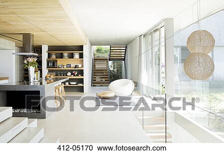 Stock Image - Open floor plan of modern house. Fotosearch