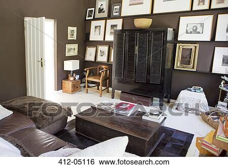 Sofa and coffee table in modern living room View Large Photo Image Stock Photograph - Sofa and coffee table in modern living room. Fotosearch
