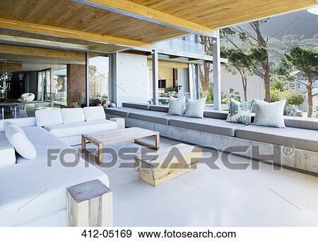 Sofas and tables on modern patio View Large Photo Image Stock Photo - Sofas and tables on modern patio. Fotosearch