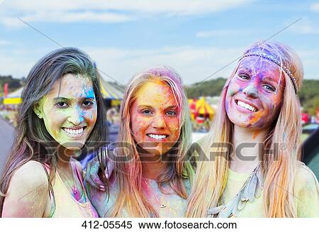Portrait of smiling women covered in chalk dye at music festival View Large Photo Image Stock Photography - Portrait of smiling women covered in chalk dye at music festival. Fotosearch