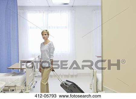 Patient leaving hospital room View Large Photo Image Stock Image - Patient leaving hospital room. Fotosearch