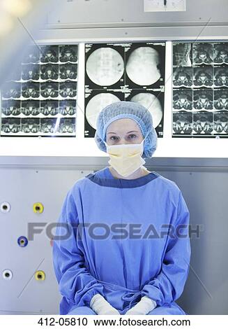 Surgeon sitting with x-rays View Large Photo Image Stock Image - Surgeon sitting with x-rays. Fotosearch