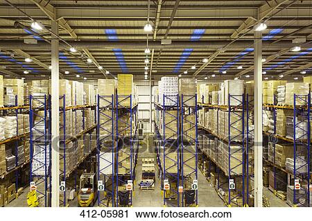 Stock Image - Stacks of boxes in warehouse. Fotosearch