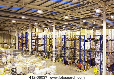 Stacks of boxes in warehouse View Large Photo Image Stock Photo - Stacks of boxes in warehouse. Fotosearch