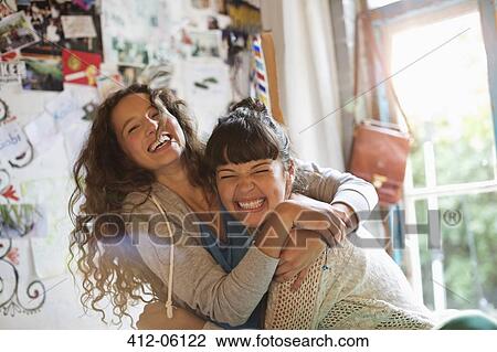 Women playing together indoors View Large Photo Image Stock Image - Women playing together indoors. Fotosearch