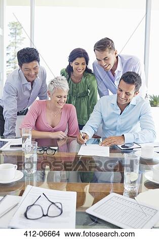 Business people signing contract in meeting View Large Photo Image Picture - Business people signing contract in meeting. Fotosearch