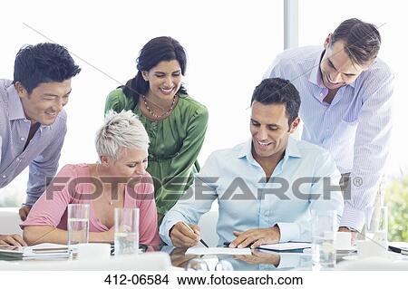 Business people talking in meeting View Large Photo Image Picture - Business people talking in meeting. Fotosearch