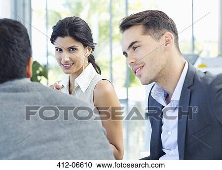 Business people talking in meeting View Large Photo Image Stock Image - Business people talking in meeting. Fotosearch